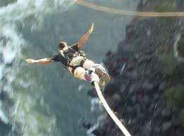 THIS IS BUNGEE JUMPING OVER A RIVER